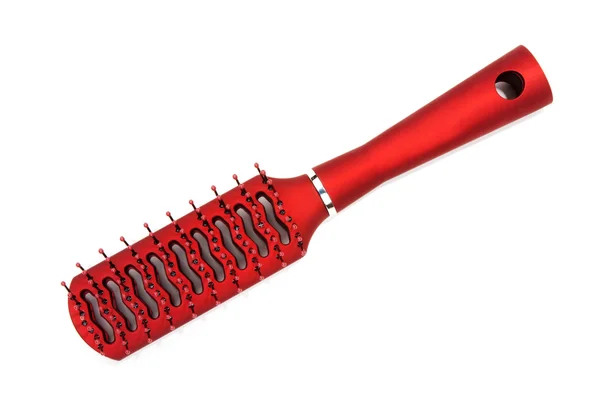 Red massage plastic comb — Stockfoto