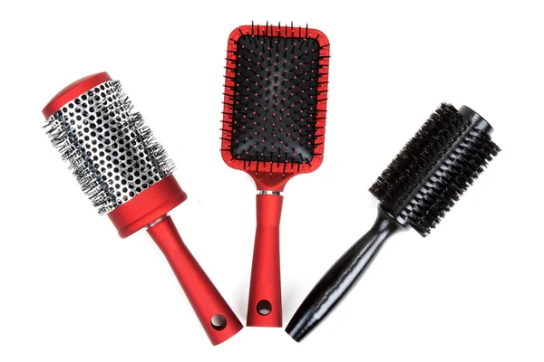 Three red massages comb on white background — Stock Photo, Image