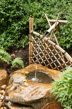 Bamboo fence and pipe clipart