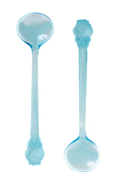 Due cucchiai di plastica trasparente blu — Foto Stock