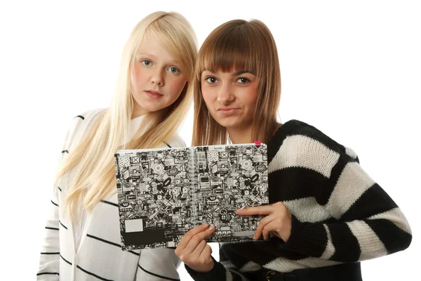 Two beautiful girls read diary book — Stock Photo, Image