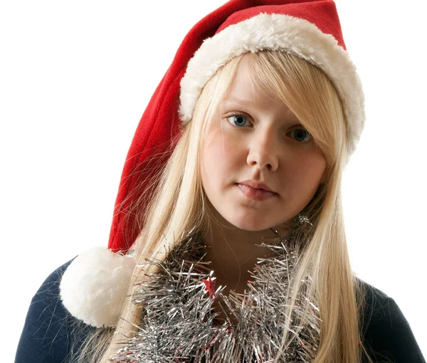 Eine schöne junge Blondine mit Weihnachtsmütze — Stockfoto