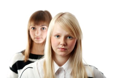 Portrait two girls small depth to sharpnesses on white background clipart