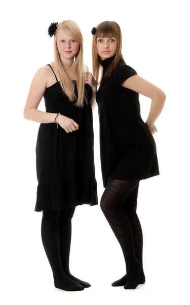 Zwei Mädchen Schwarzen Kleidern Mit Weißem Hintergrund — Stockfoto