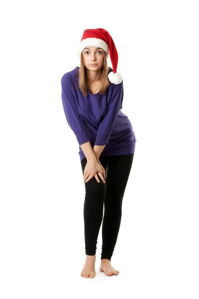 Gyönyörű lány piros santa kalap — Stock Fotó