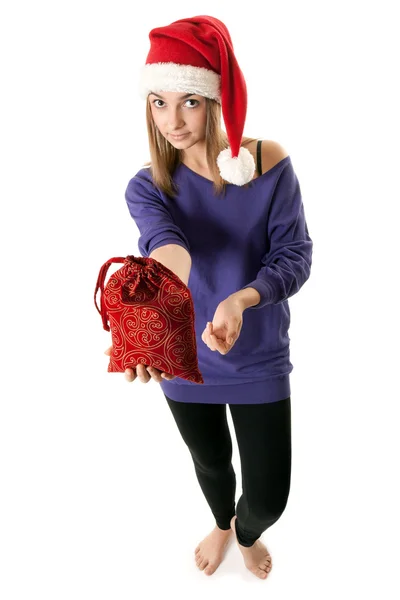 Schönes Mädchen mit rotem Weihnachtsmann-Hut — Stockfoto