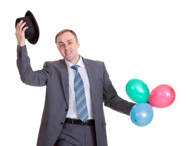 膨脹可能な色のボールと黒の帽子の実業家 — ストック写真