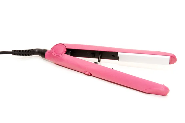 白い背景の上の電気ピンクの毛矯正 — ストック写真