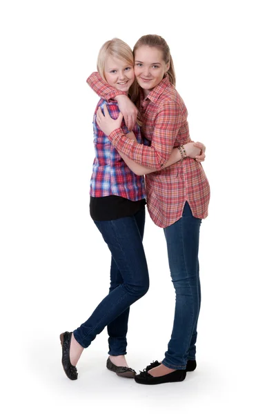 Two Girlfriends Checkered Shirts Hug White Background — Stock Photo, Image