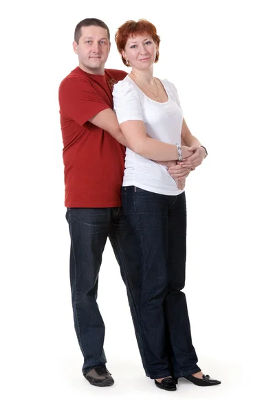 白い背景の上を抱いて美しいカップル — ストック写真