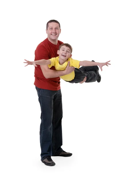 Dad keeps his son in his arms — Stock Photo, Image