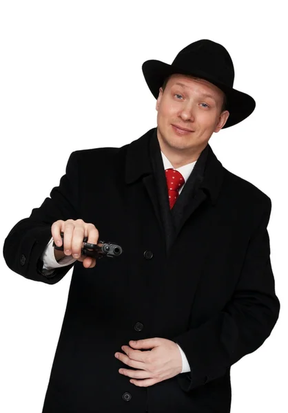 Mannen i en svart kappa och hatt — Stockfoto