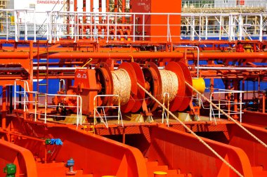 Mooring winches on deck of chemical tanker clipart