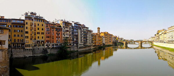 Panorama of old houses at Arno river in Florence