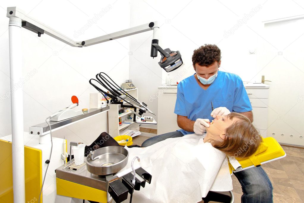 Girl at dental office during teeth exam