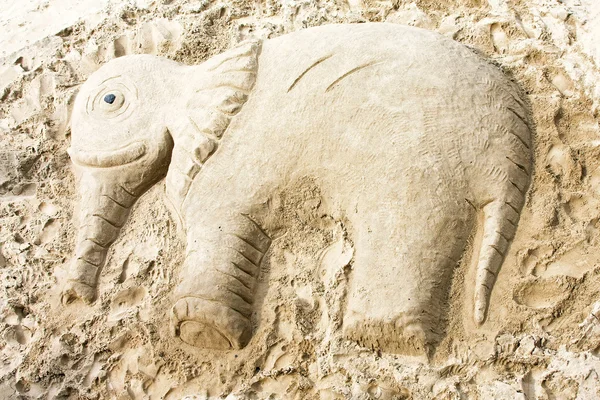 stock image Big elephant sculpture in sand at beach