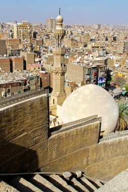 Sunny day in Cairo cityscape from mosque tower top clipart