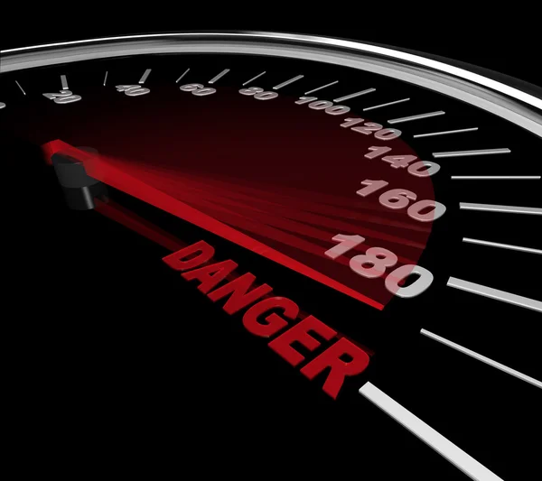 危険 - スピード メーター上の単語 — ストック写真