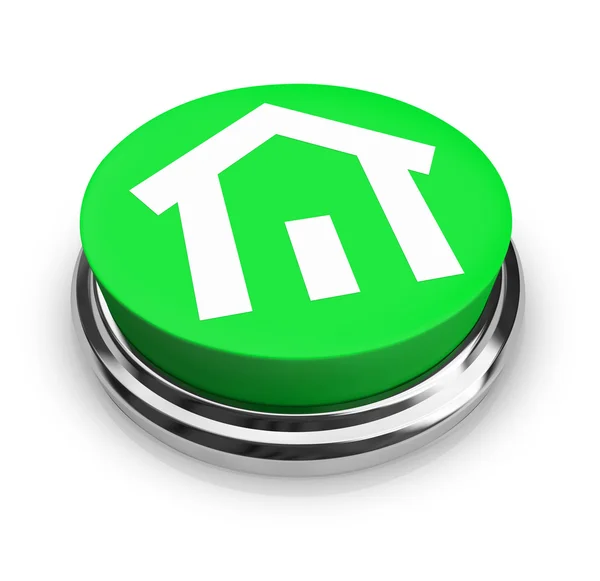 Casa en botón verde redondo —  Fotos de Stock