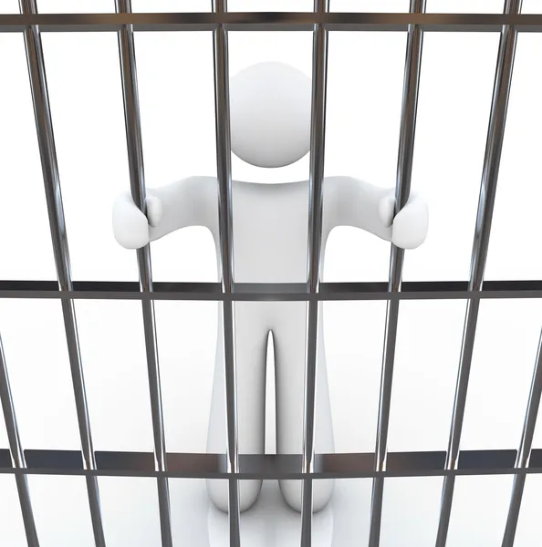 Muž ve vězení, držící tyče — Stock fotografie