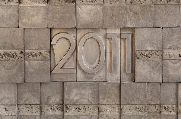 2011 - metal printing blocks background — Stock Photo, Image