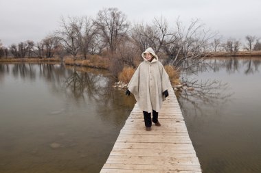 Senior woman enjoys a walki alone clipart