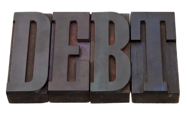 Palabra de deuda en tipografía —  Fotos de Stock