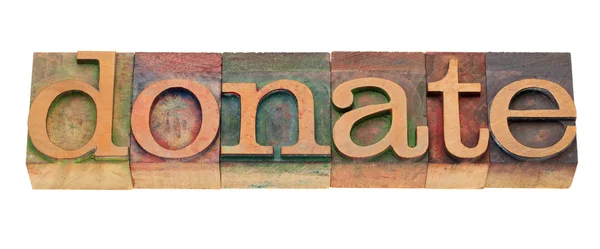 Doneren - word in letterpess type — Stockfoto