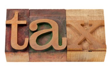 Tax word in wood fonts clipart