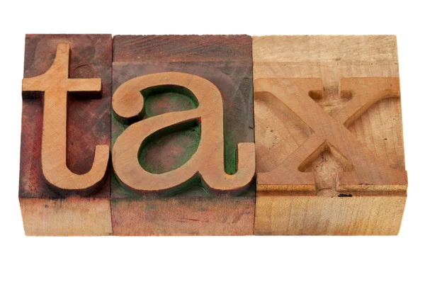 Tax word in wood fonts — Stock Photo, Image