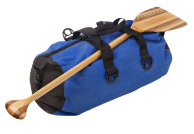 Canoe paddle and waterproof duffel clipart