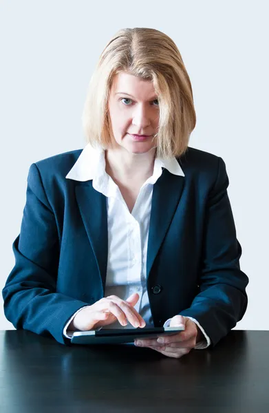 stock image Closeup of a business woman with tablet pc and headset