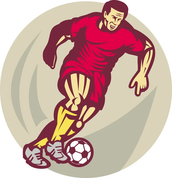 Fußballer läuft und tritt den Ball — Stockfoto