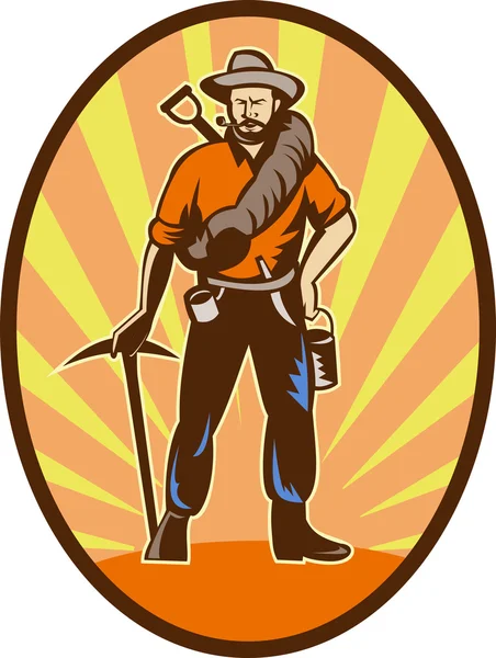 Miner, prospector or gold digger with pick axe and shovel — Stockfoto