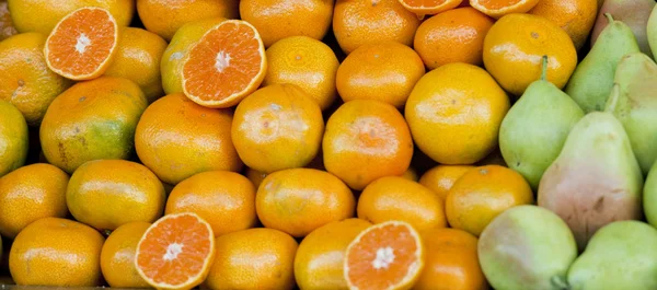 Orange and pear — Stock Photo, Image