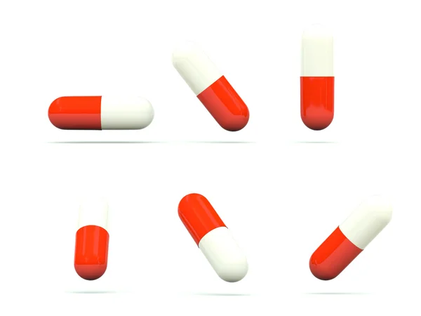 Таблетки изолированы на белом — стоковое фото