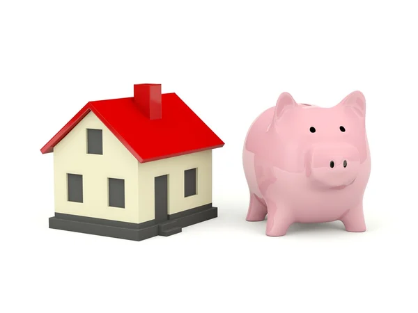 Piggy bank met huis — Stockfoto