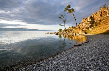 Tranquil coast of Lake Baikal. Olkhon island. Russia. Siberia. clipart