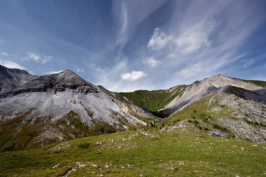 Beautiful landscape with mountains, sky and clouds clipart