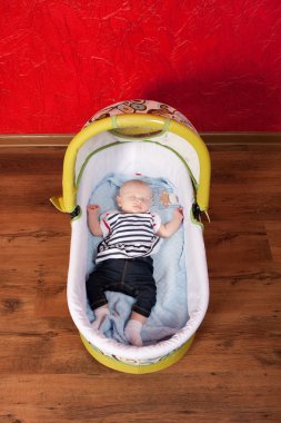 Baby Girl Sleeping in the Living Room clipart