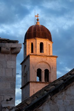 Franciscan Monastery Tower at Sunset clipart