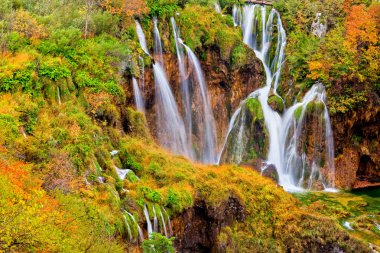 Scenic autumn landscape with beautiful waterfalls in the Plitvice Lakes National Park in Croatia clipart