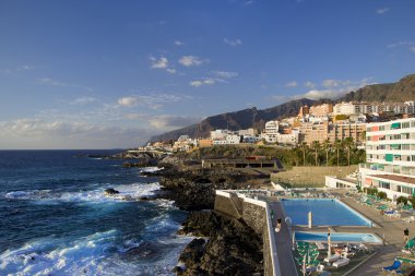 Puerto de Santiago and Los Gigantes by the Atlantic Ocean in Tenerife clipart