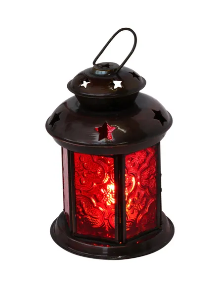 Декоративная лампа с горящей свечой — стоковое фото