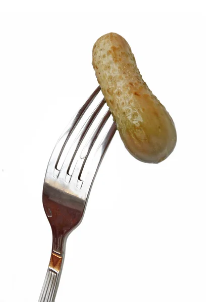 Salt cucumber on a fork — Stock Photo, Image