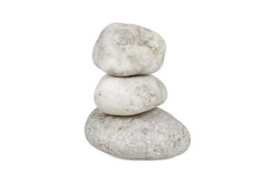 drie stenen op elkaar gestapeld op een witte achtergrond