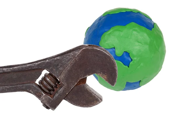 Plasticine Globe and wrench — Stock Photo, Image