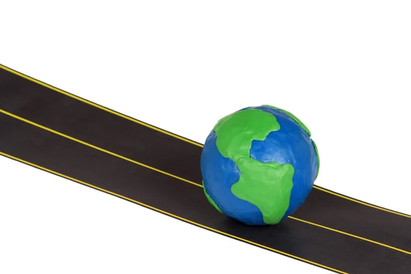 Knetgummi-Globus auf Autobahn — Stockfoto