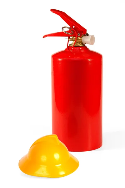 Fire extinguisher and a fire helmet — Stock Photo, Image