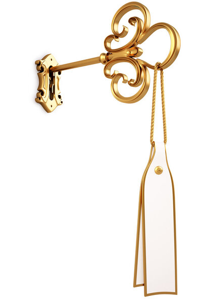 Golden key with a tag is inserted into the keyhole. isolated on white. with clipping path.